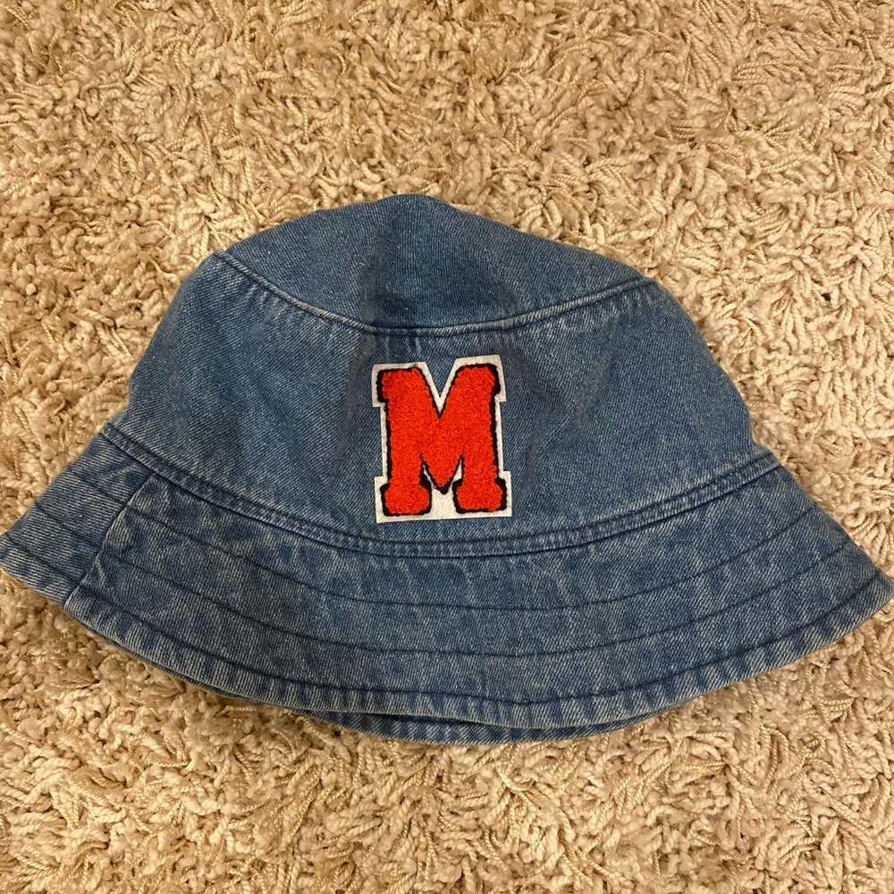 Denim bucket hat with red M patch